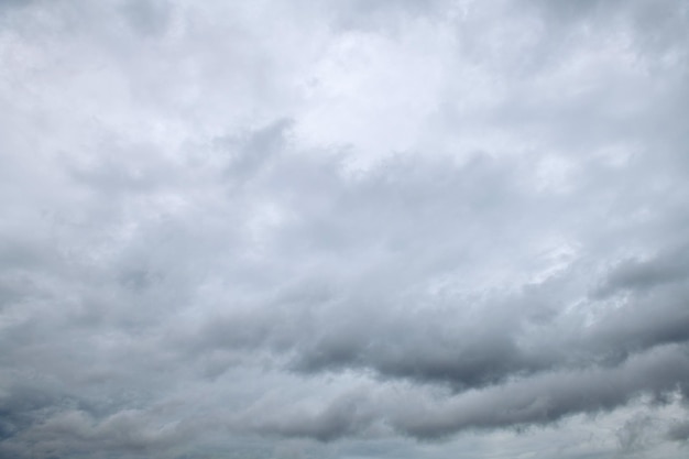 White and grey clouds scenic nature environment background Storm clouds floating in a rainy day with natural light Cloudscape scenery overcast weather above blue sky