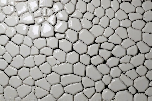 Photo a white and grey tile with a white pattern