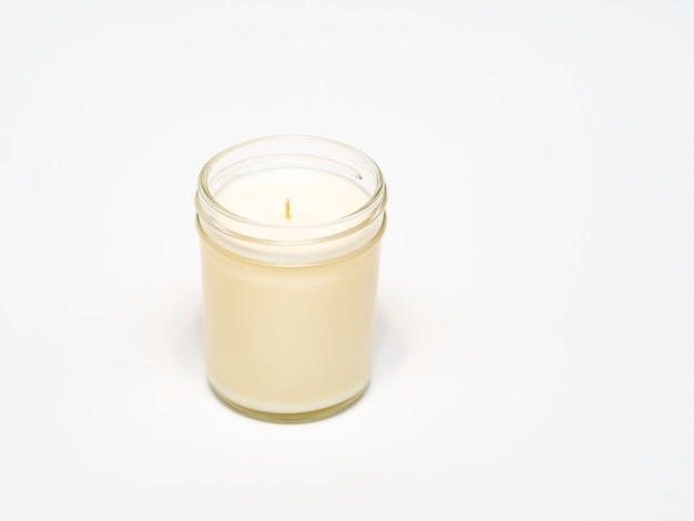 White handmade candle in white background