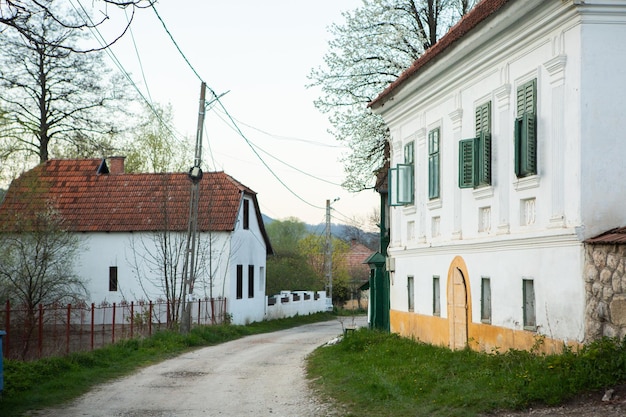 A white house with green shutters