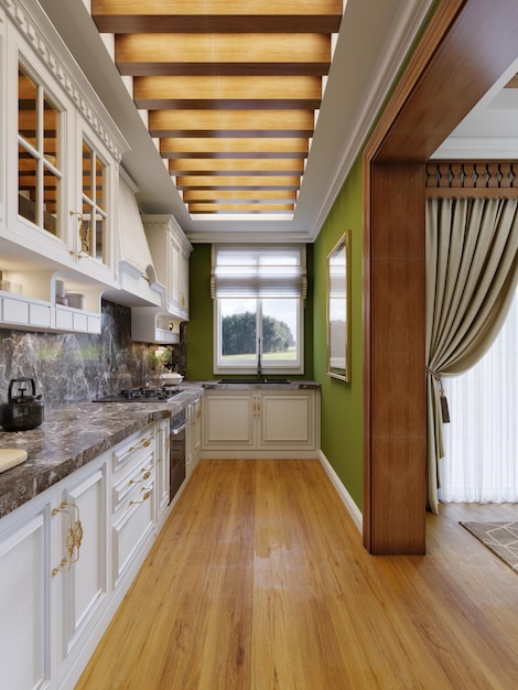 White kitchen furniture in the interior of the kitchen in the Arabian style with green walls