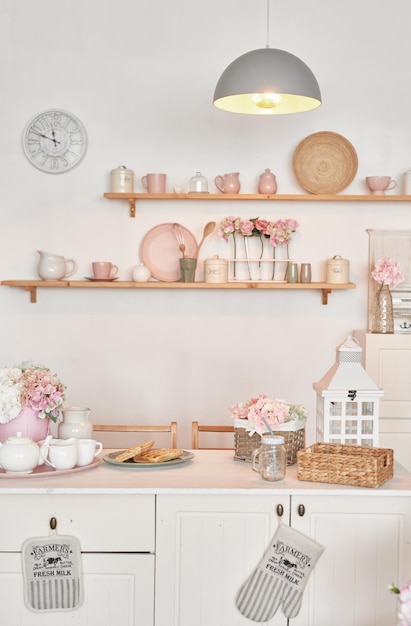 White kitchen interior Crockery and kitchen utensils