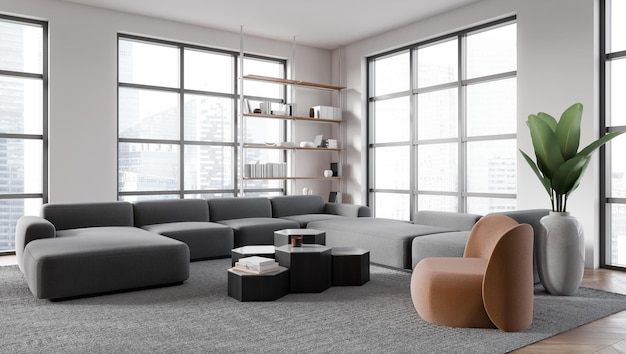 White living room corner with couch and armchairs