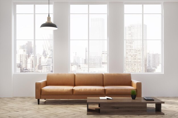 White living room with a beige sofa windows