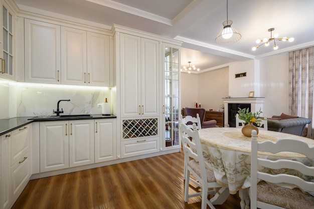 White luxiry modern classic kitchen furniture with dining table