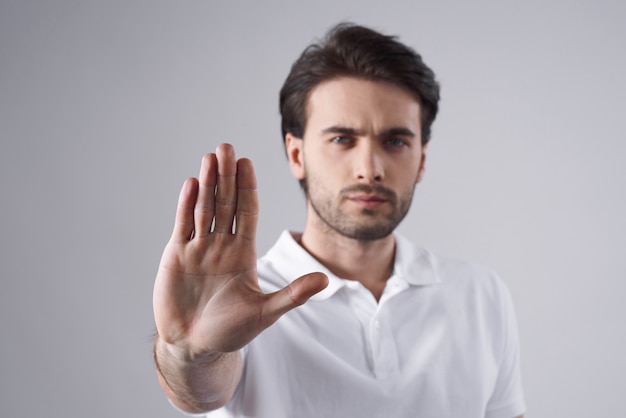 White man posing with hand gesture isolated.