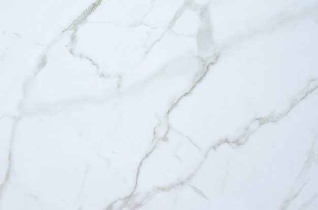 White marble background with streaks.