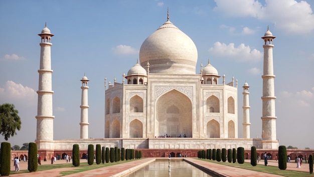 a white marble mausoleum with columns and a blue sky