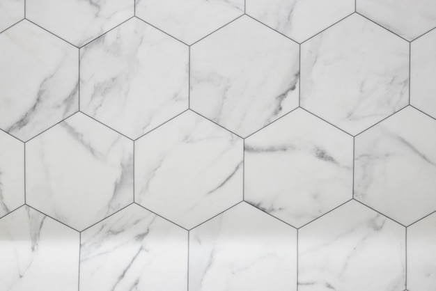 white marble wall with hexagon tiles for texture and background