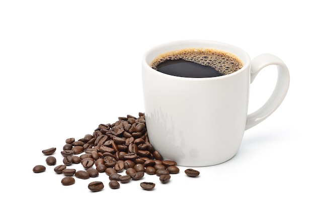 White mug of black coffee with roasted coffee beans