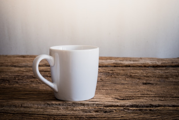 White mug on wooden tabletop