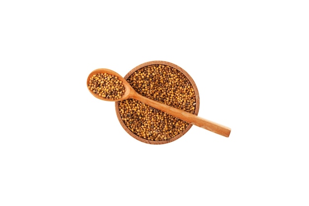 White mustard seeds in wooden bowl on white background top view Design element