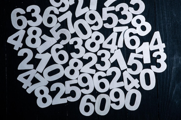 White numbers on a black background