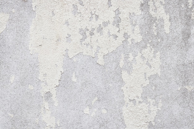 White old wall texture with cracked and peeled in vintage style for background and design art work.