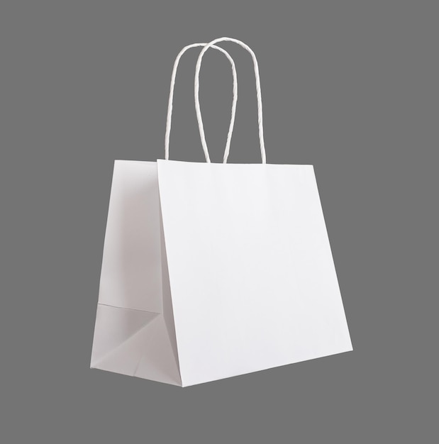 White paper bag shopping parcel packet with handles isolated