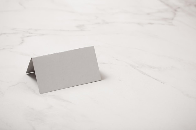 White paper blank on marble background