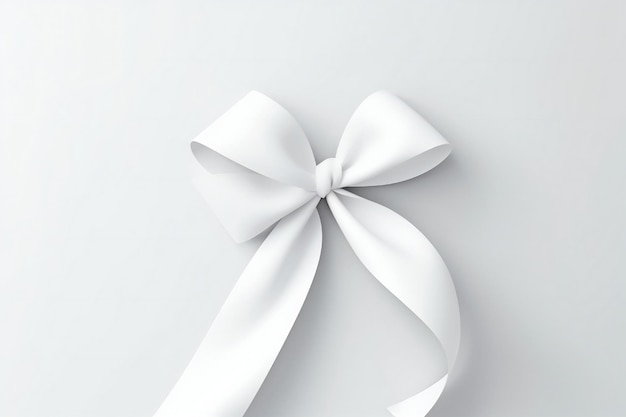 Photo white paper bow ribbon on white background