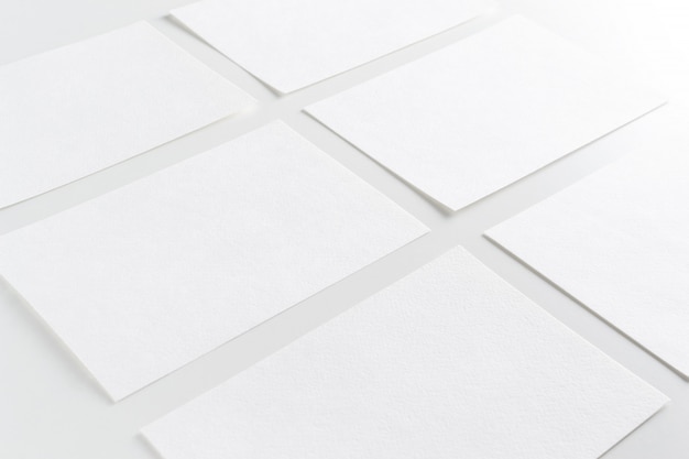 white paper business cards in row