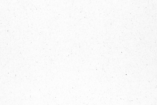 White paper or cardboard texture with black spot background.