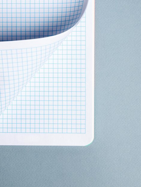 White Paper sheet background isolated on blue close up