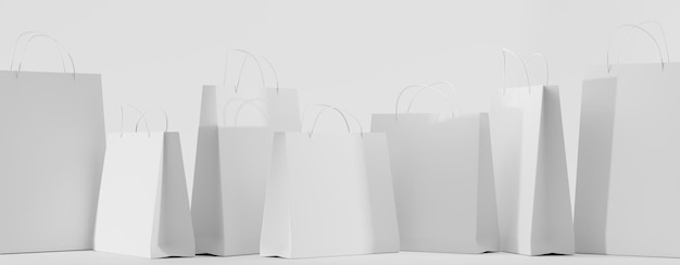 White paper shopping bags Blank gift packages with handles rectangular and square for carry or takeaway isolated mock up for corporate design on cardboard bag for store or market 3d illustration