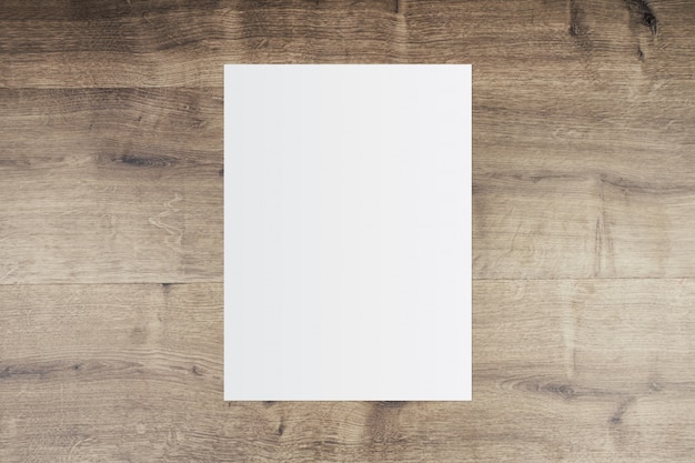 Photo white paper and space for text on old wooden background