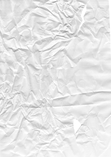 White paper with torn parts and wrinkled surface