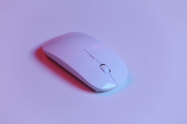 White pc mouse in red-blue neon light