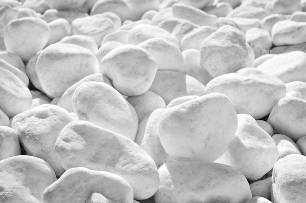 White pebble stones texture background