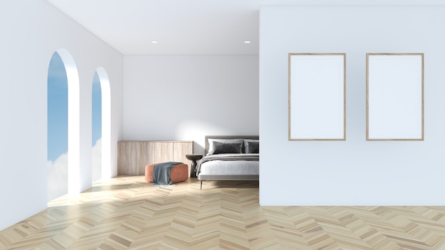 White photo frame on the white wall The room is decorated with a bed, a seat, and a showcase on a parquet floor.