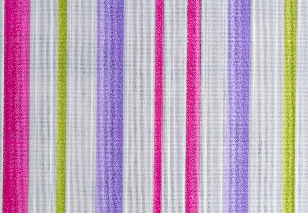 White and pink.green and violet striped fabric. Fabric texture,background for design.