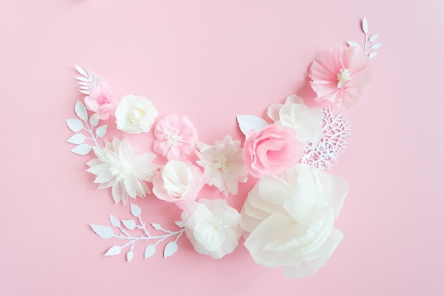 White and pink paper flowers on pink