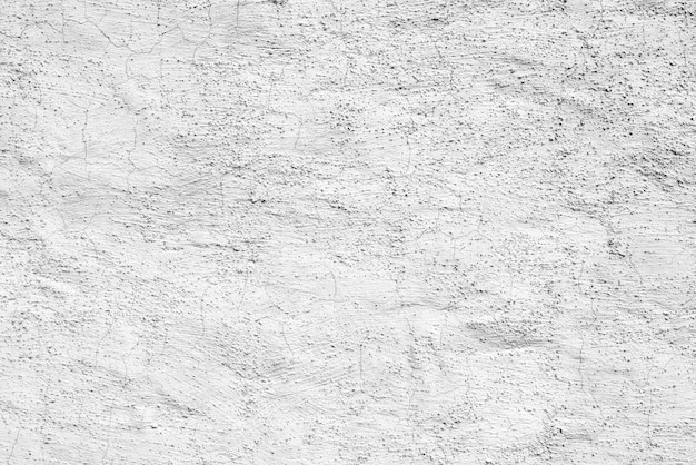 White plaster texture. The rough surface of the wall of an old house.