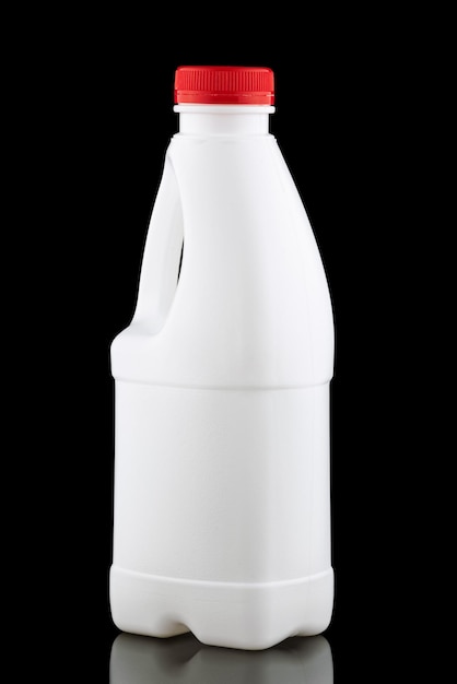 White plastic bottle with handle black background