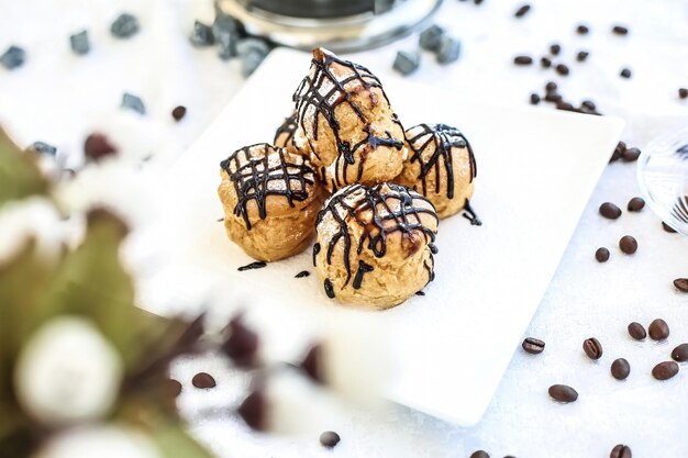 Photo white plate with chocolatecovered cookies