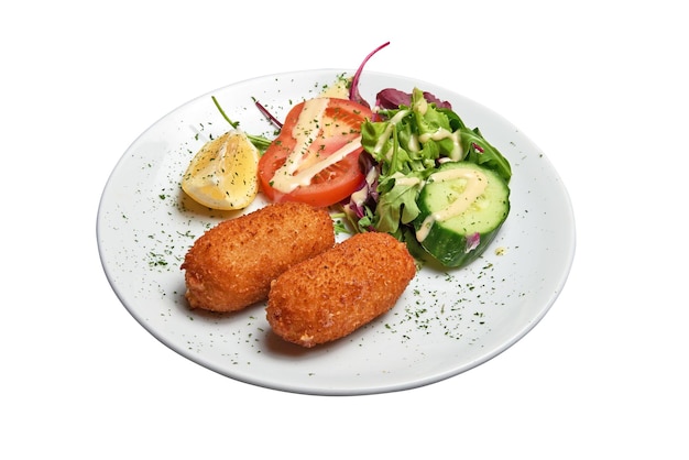 White plate with two Shrimps croquettes ans salad Isolated