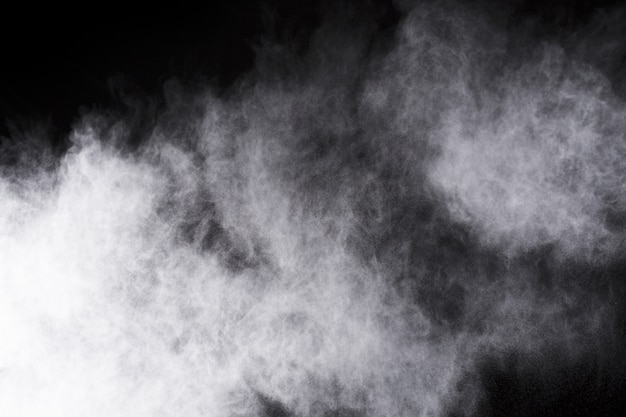 White powder explosion on black background.  