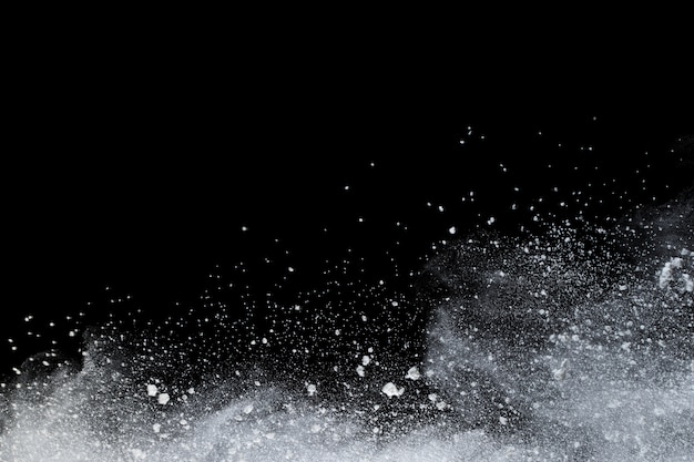 White powder explosion on black background