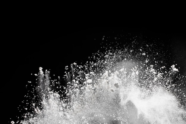 White powder explosion on black background.  