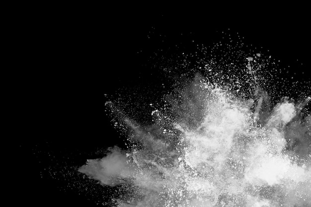 White powder explosion on black background.