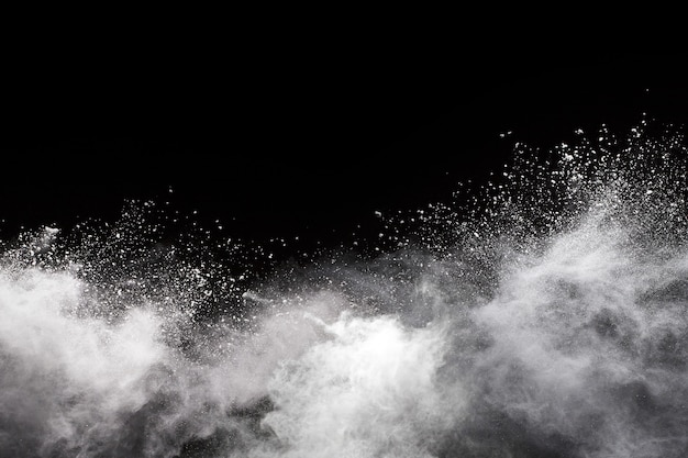 White powder explosion on black background