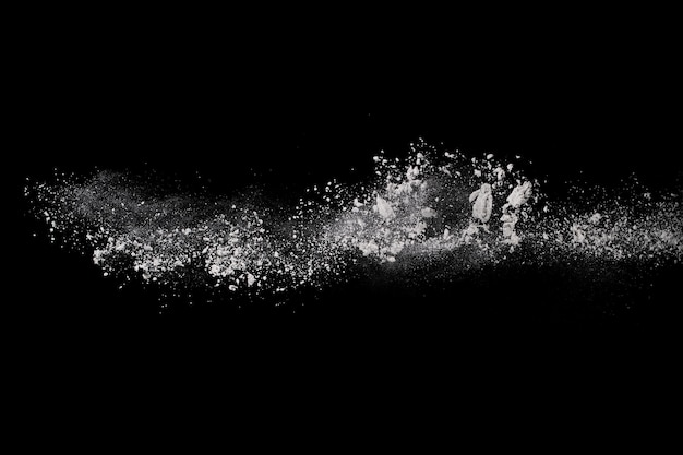 White powder explosion on black background