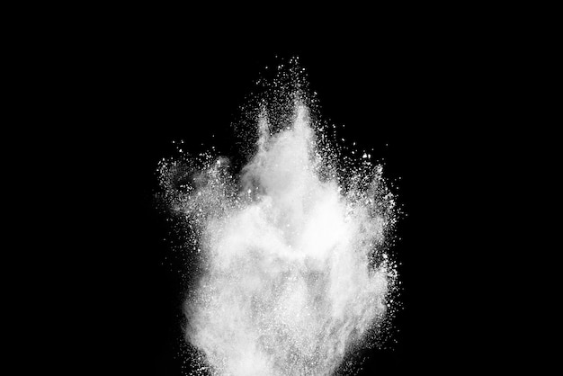 White powder explosion isolated on black 