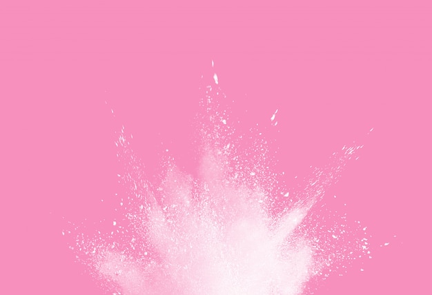 White powder explosion on pink background