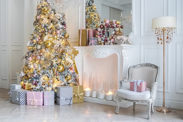 White room interior with christmas tree decorated