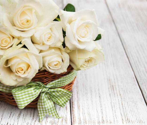 White roses in a basket