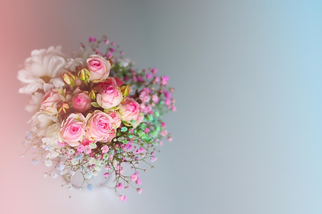 White roses and chrysanthemums on a white background. Bride's bouquet. background. Soft pastel colors. Background for postcards, invitations, and greetings.