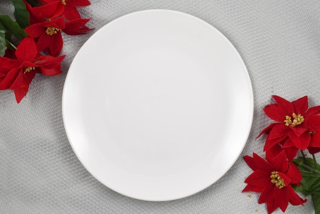 White Round Plate Mockup with Festive Poinsettias