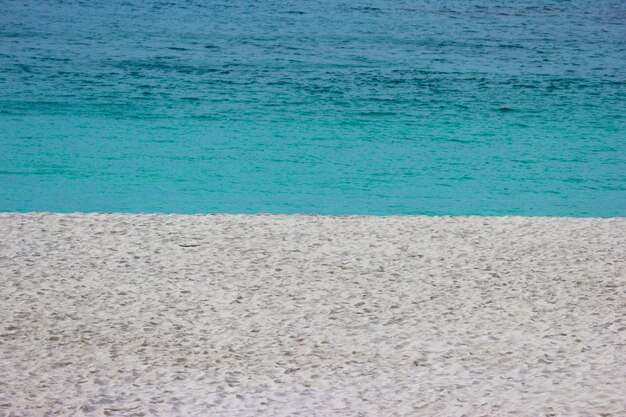 White sand beach and blue waves sea at Shirahama beach.