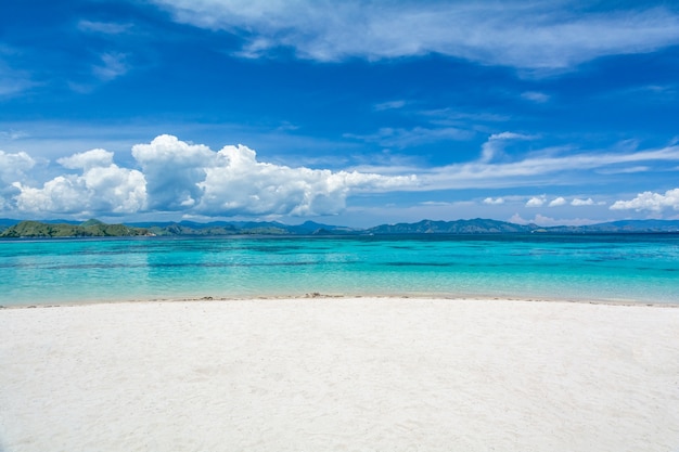 White Sand Beach with Two Different Color of ClearBlue Sea at Kanawa Island, Komodo